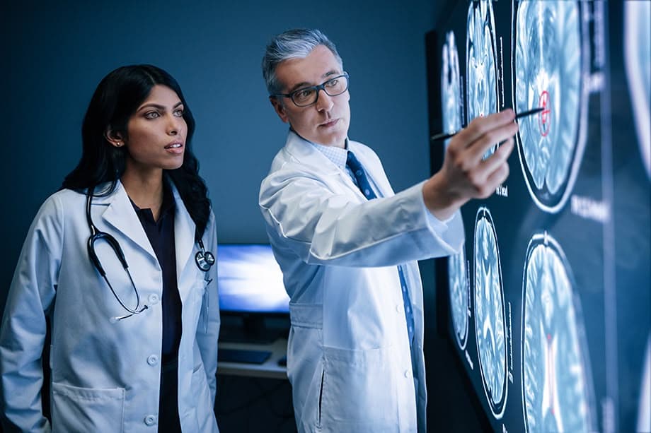 Clinical research professionals collaborating in a modern research facility